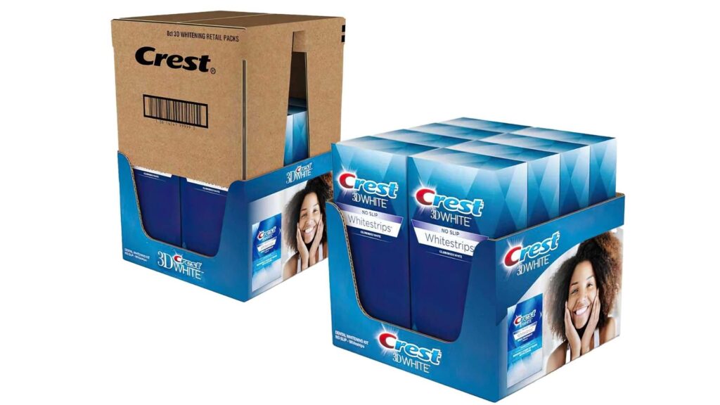 Crest 3D White tray and hood packaging showing retail-ready display and outer protective box with branding.