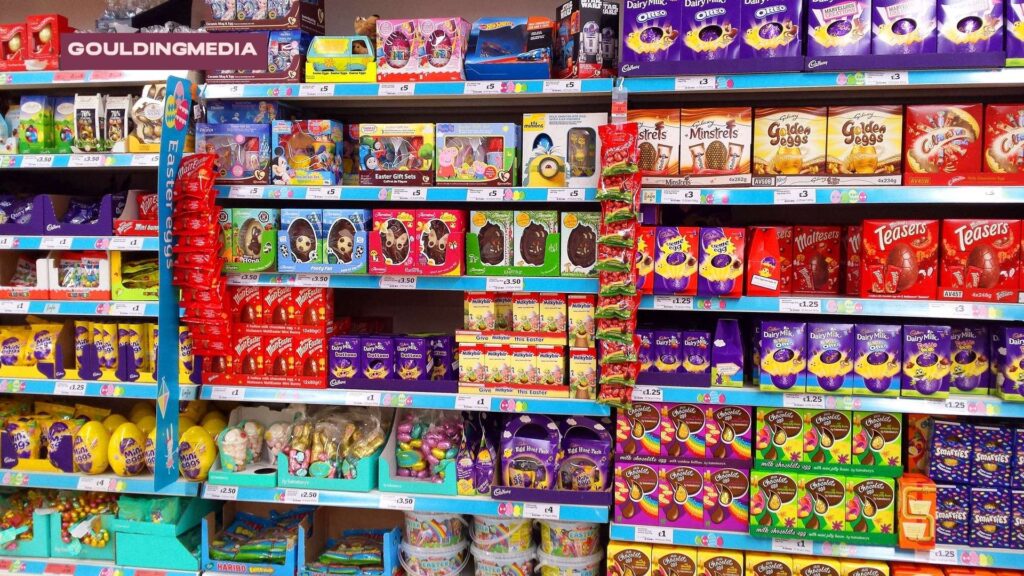 Colourful shelves filled with food products in a busy supermarket aisle