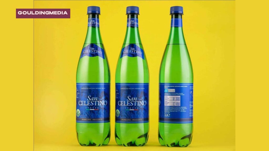 Lidl mineral water in green glass bottles against a yellow background