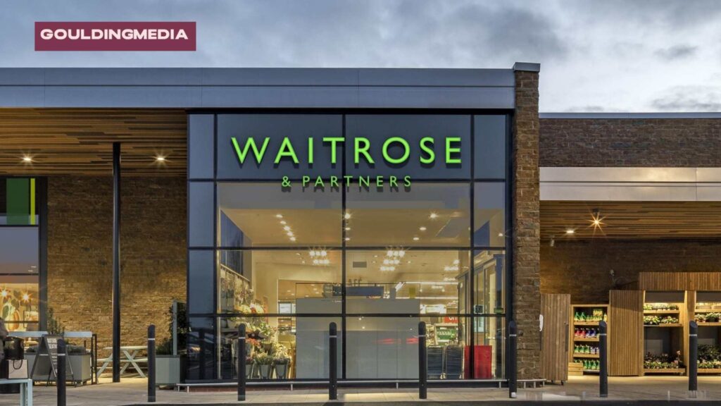 Waitrose storefront showing large glass windows and logo signage