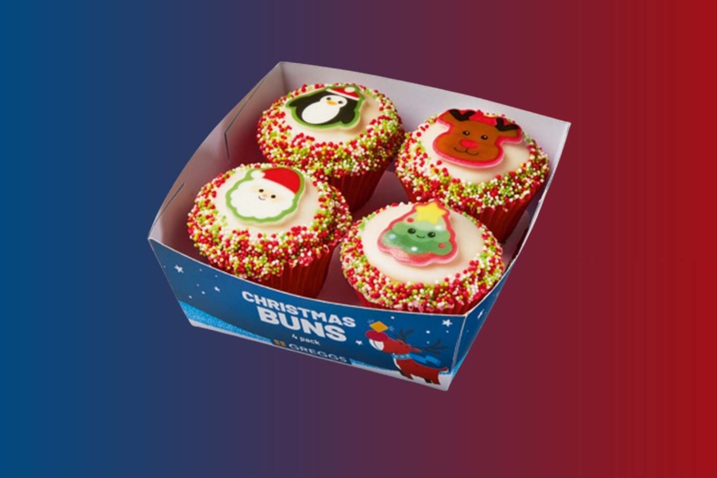 Box of four iced cupcakes with Christmas-themed decorations.