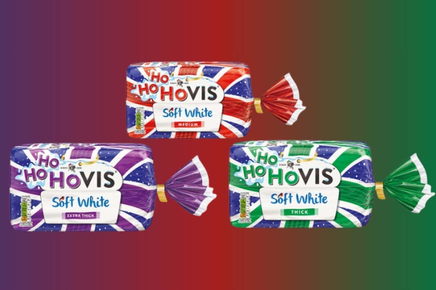 Trio of Hovis bread loaves in festive wrapping with candy canes and snowflakes