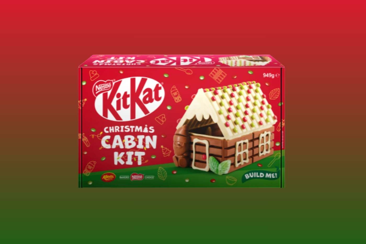 Red box showing a DIY KitKat gingerbread-style cabin with icing and chocolate pieces.