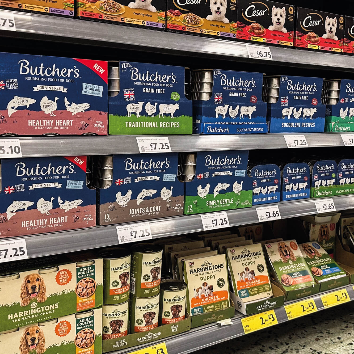 Butcher’s grain free dog food packaging displayed on supermarket shelf with full product range visible