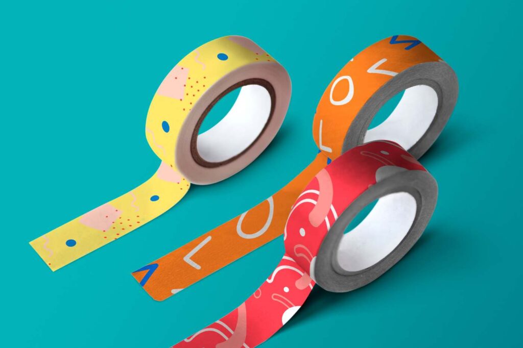 Colourful printed rolls of custom packing tape on a bright background.