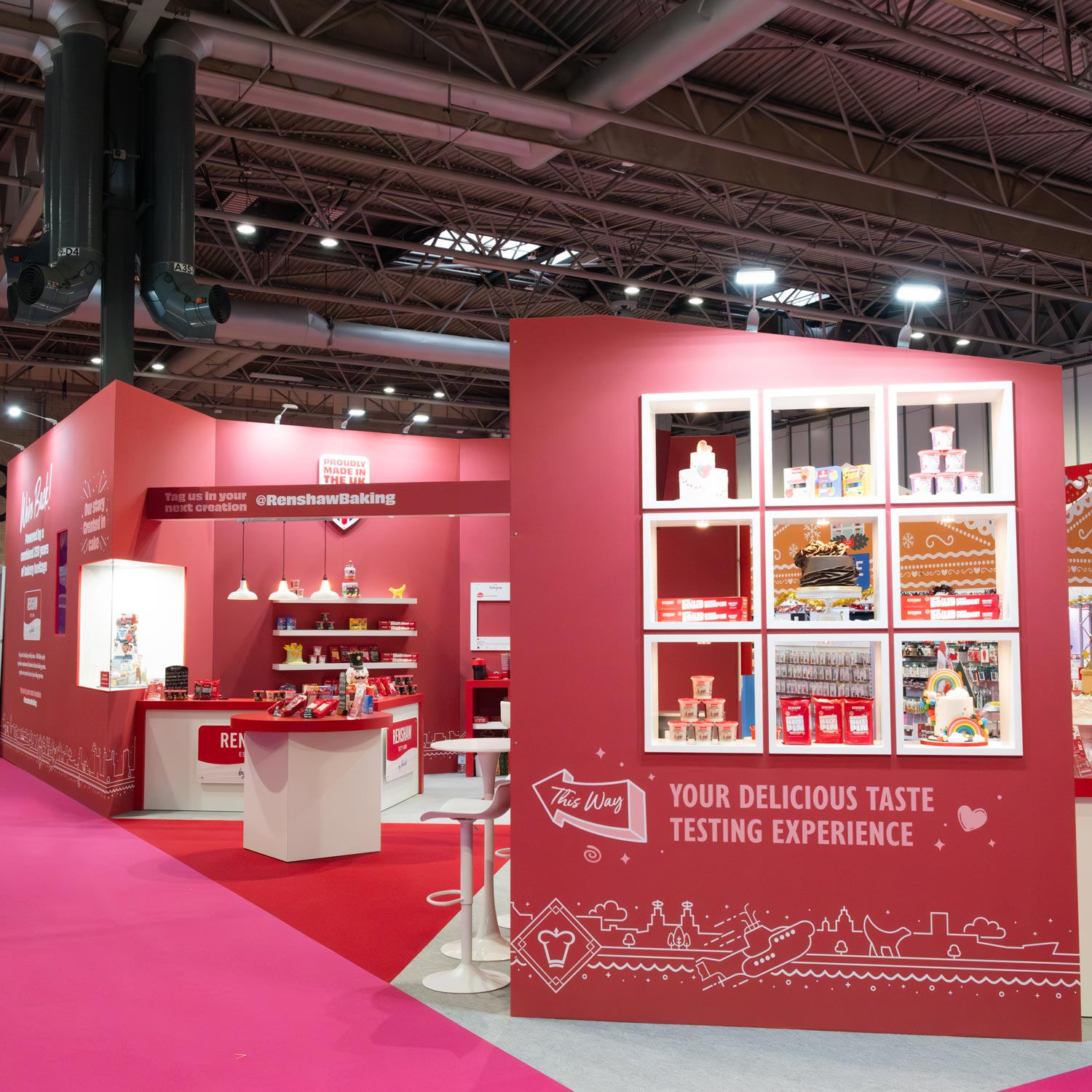 Renshaw Ready to Roll Marzipan retail floor stand fully stocked with red packs arranged neatly across branded shelves