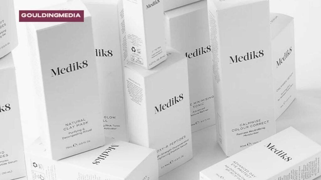 Clean, monochromatic layout of Medik8 product packaging in white boxes and minimalist jars.